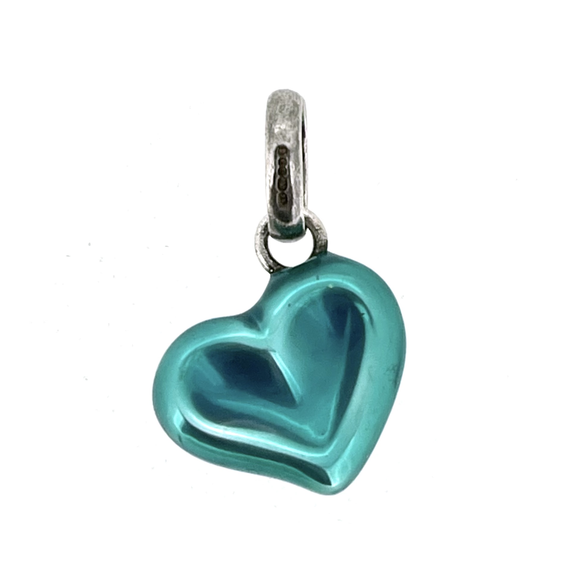 Thumbprint heart charm showing sculpted depression