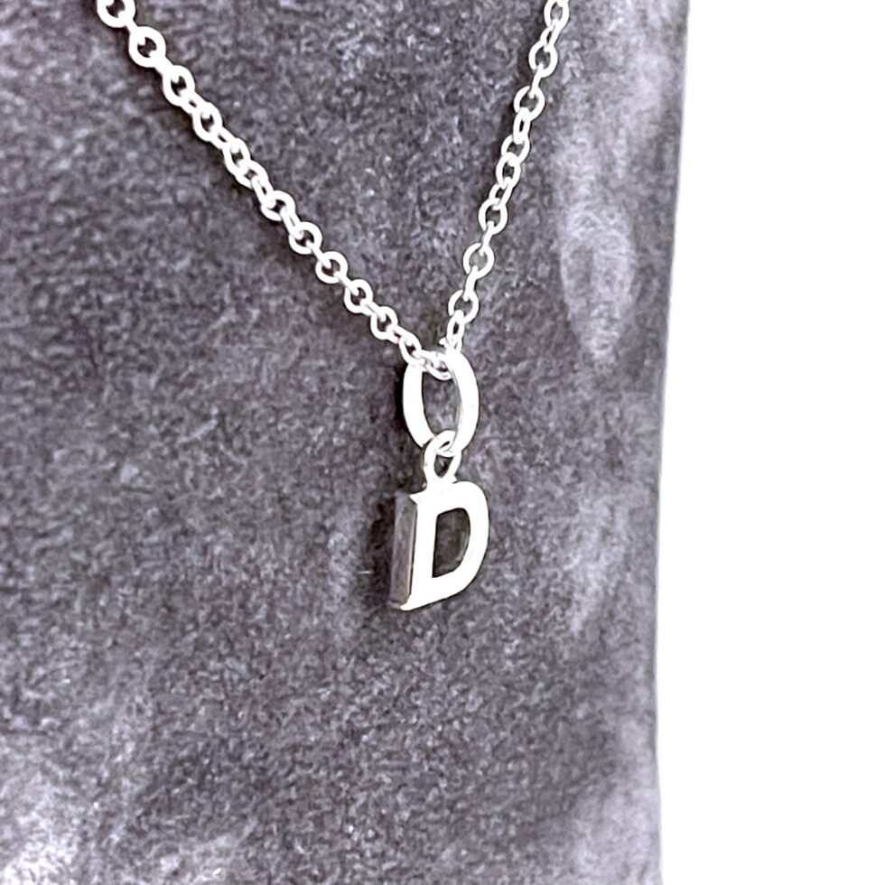 Vintage sterling silver initial D necklace with polished finish