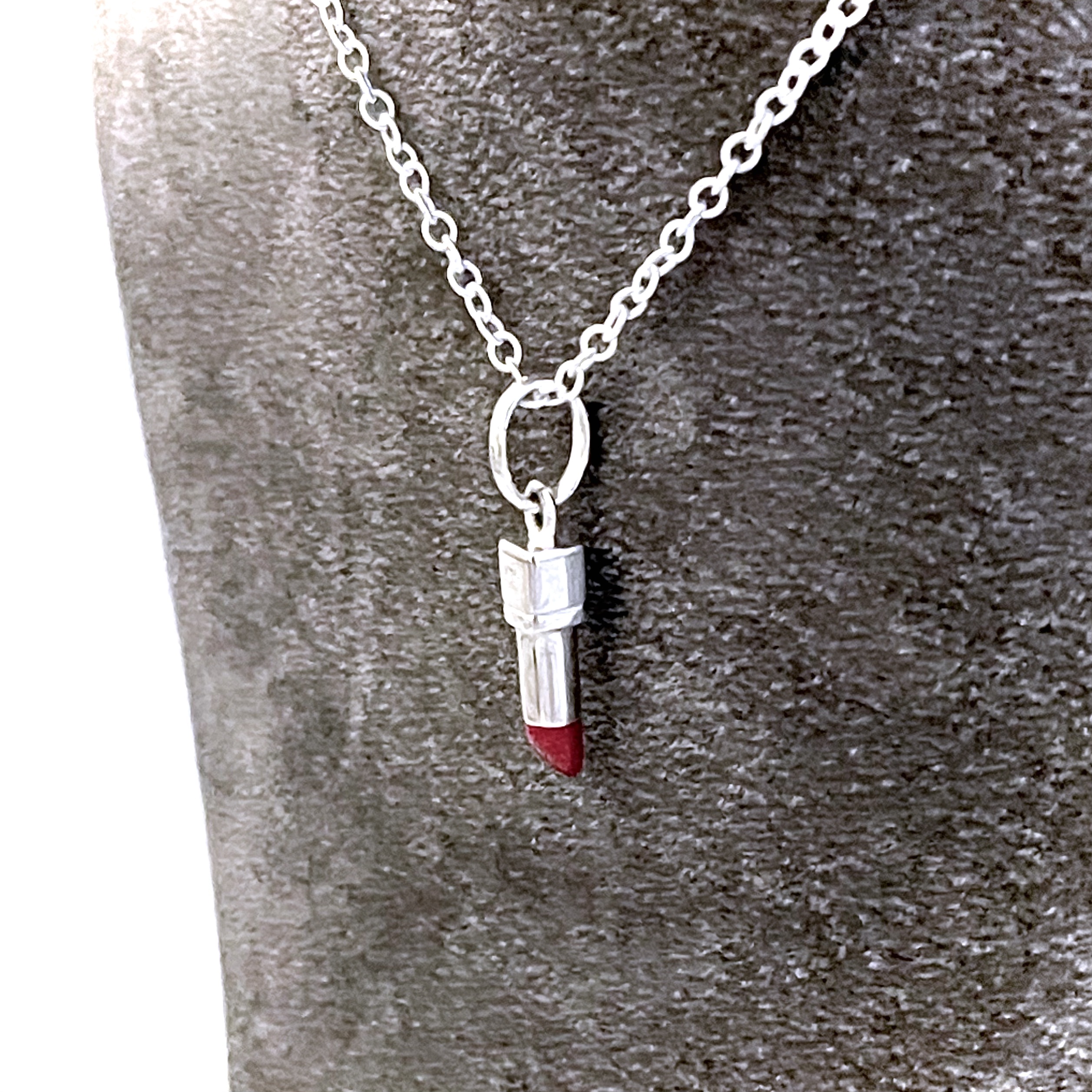Vintage sterling silver lipstick charm necklace with red enamel detail