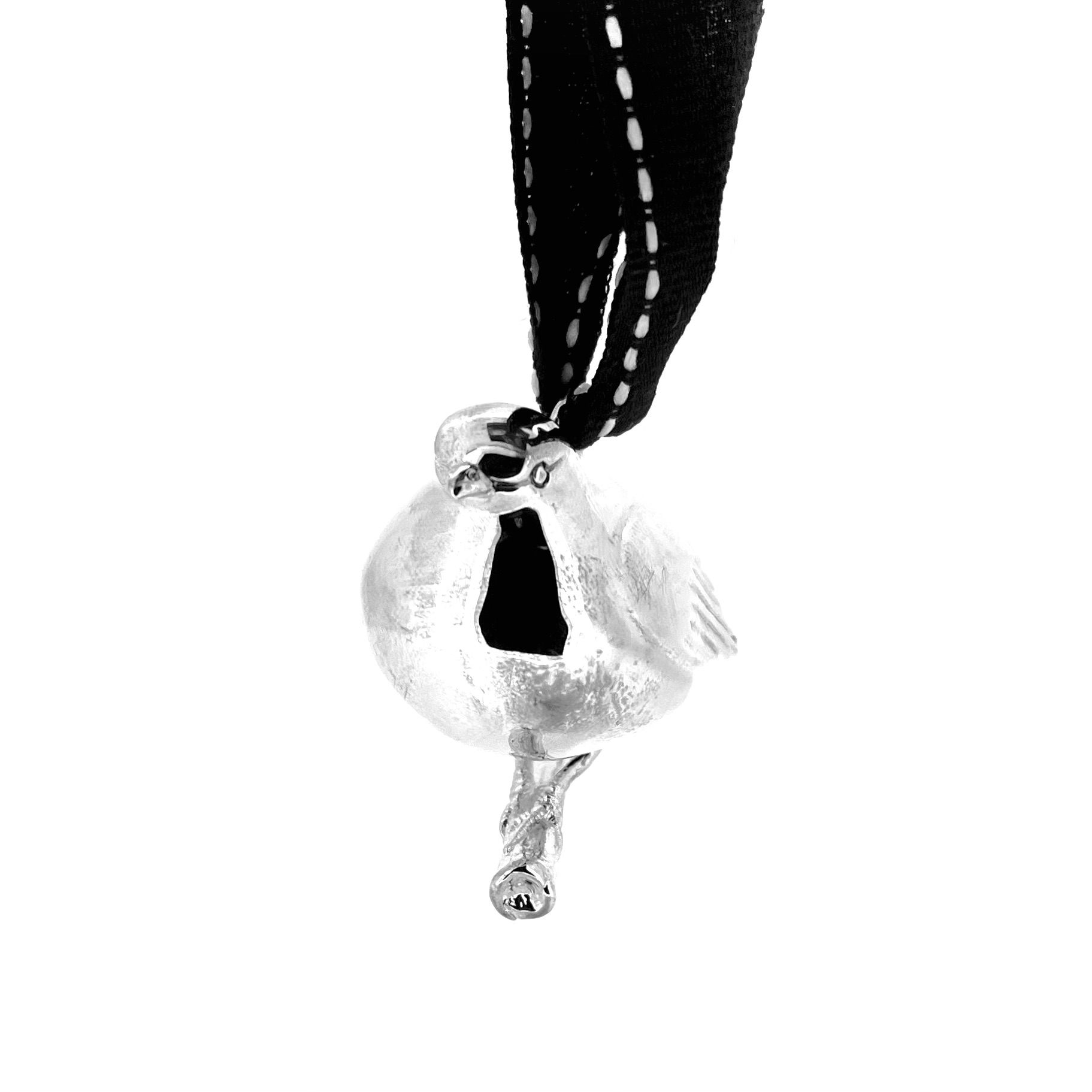 Links of London robin ornament perched on a branch with original ribbon