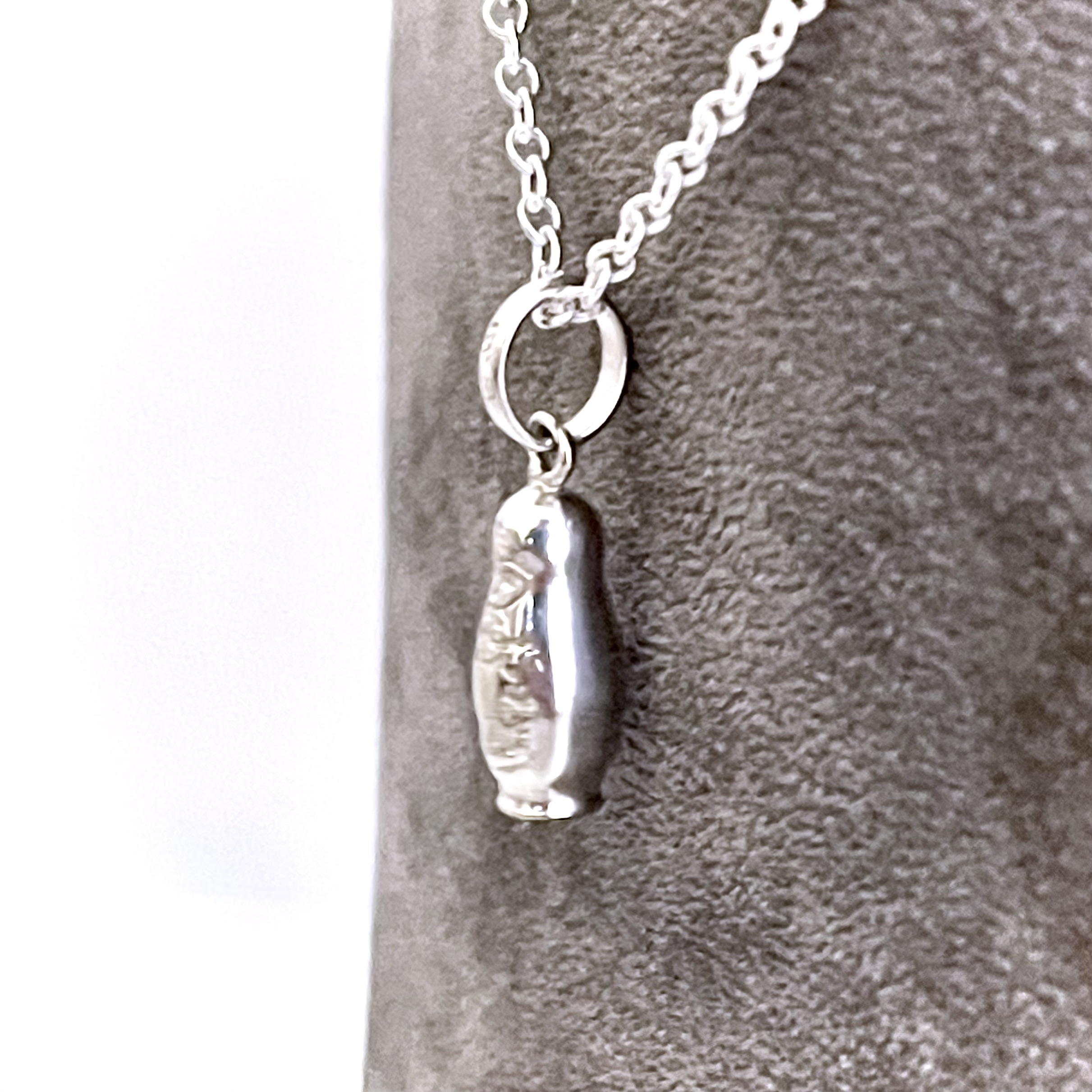 Russian Doll charm presented as a finished Links of London necklace