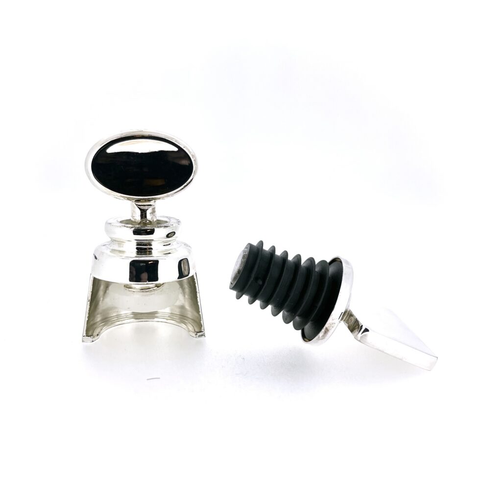 Close view of screw-down compression stopper from vintage Links of London set