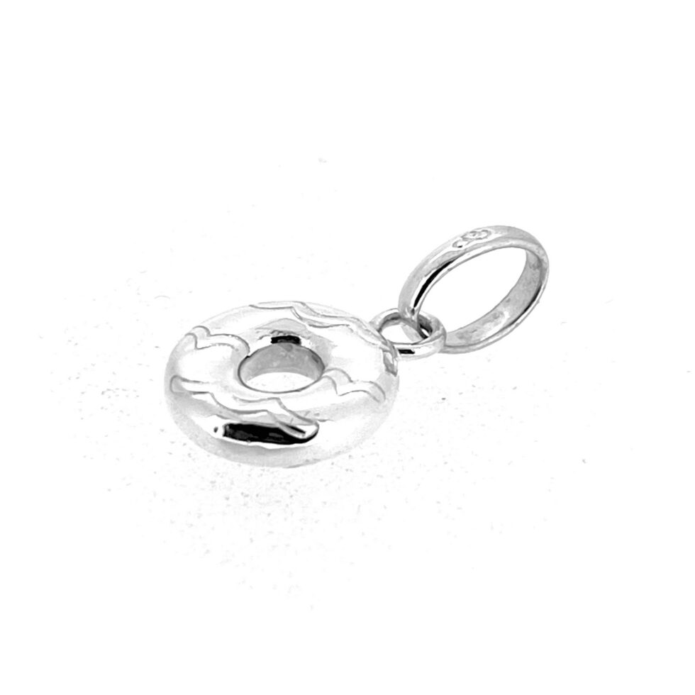 Vintage sterling silver doughnut charm angled side view