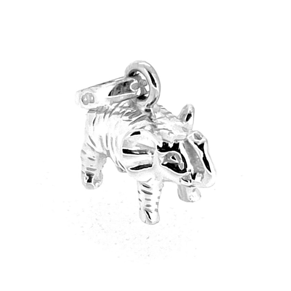 Angled view of vintage silver elephant charm with standard oval bail