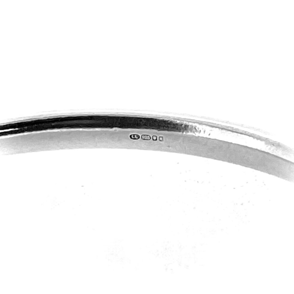 Interior hallmark detail showing LL and 925 on Links of London silver bangle