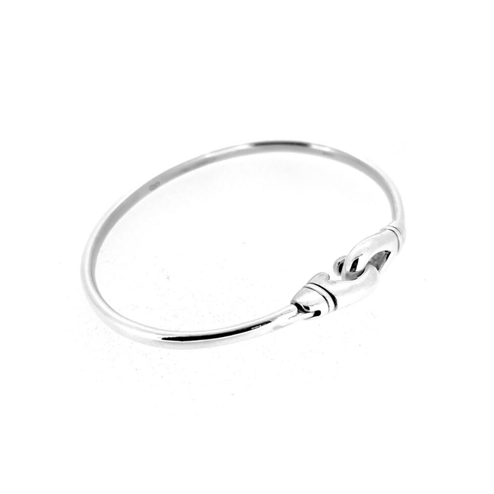 Close-up of karabiner hook clasp on vintage Links of London bangle