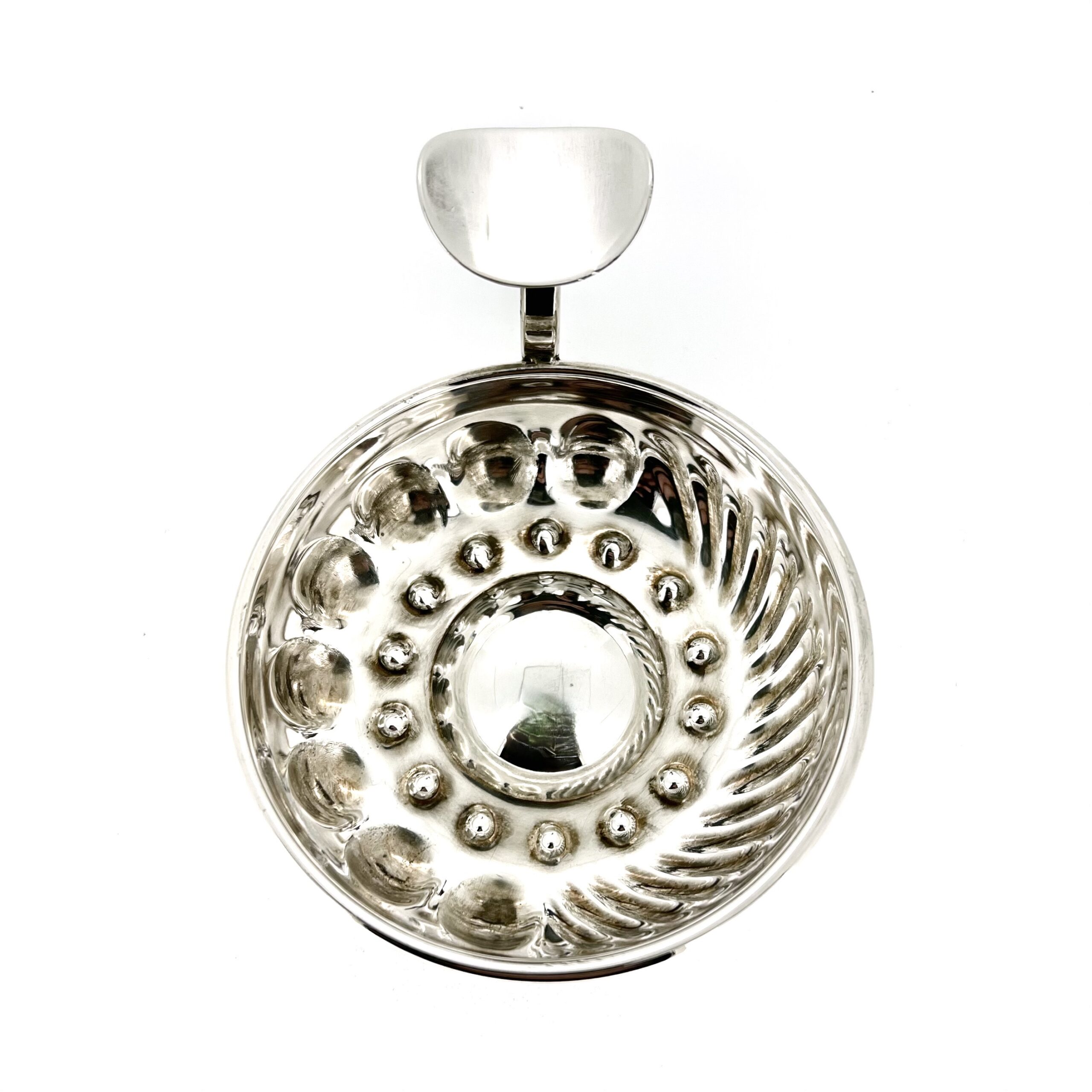 Top view of Links of London silver tastevin showing traditional reflective interior