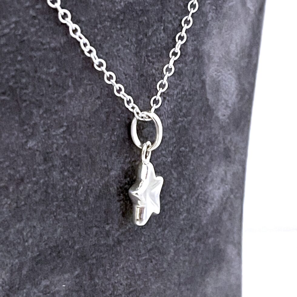 Vintage sterling silver Thumbprint Star necklace with sculpted form