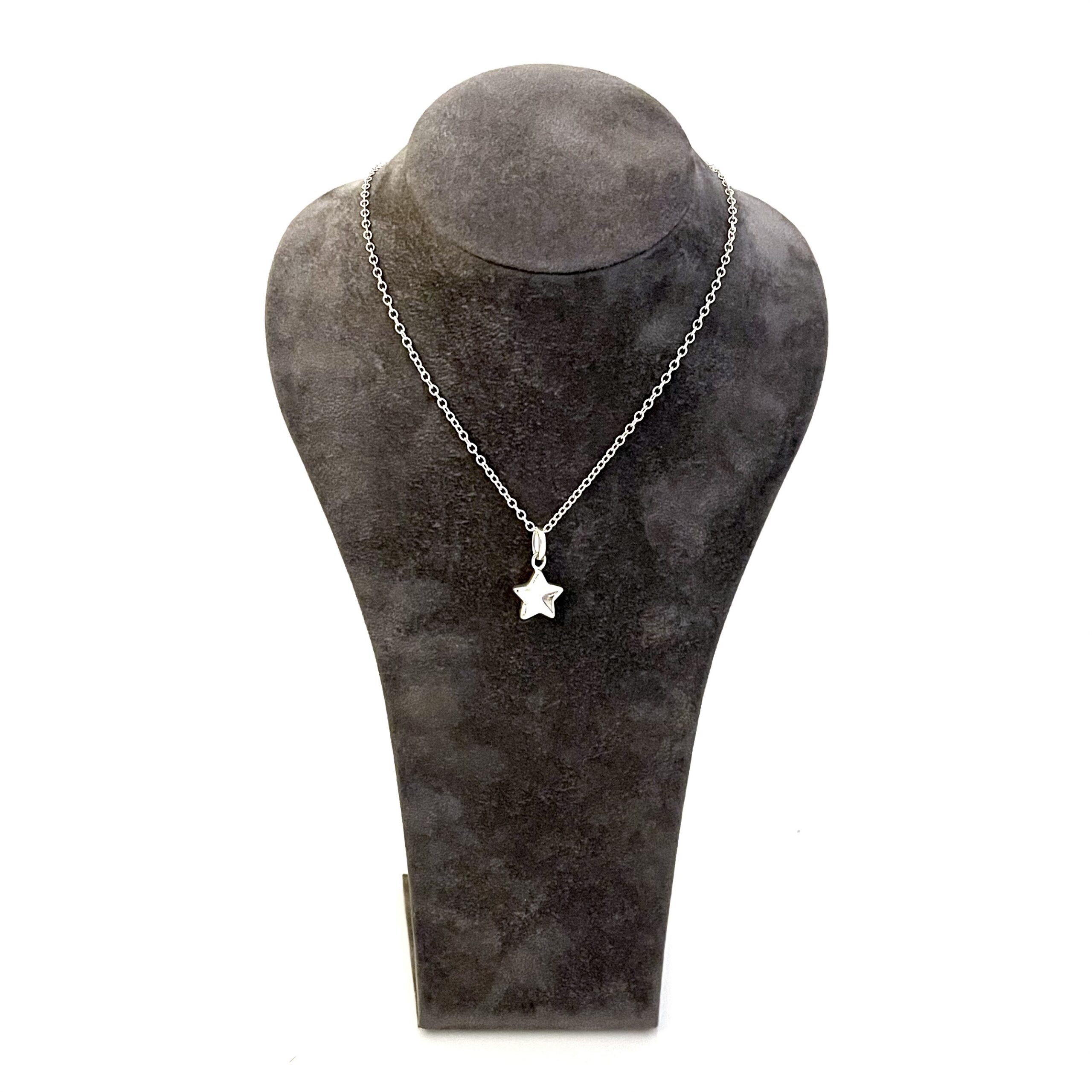 Thumbprint Star charm presented as a finished Links of London necklace