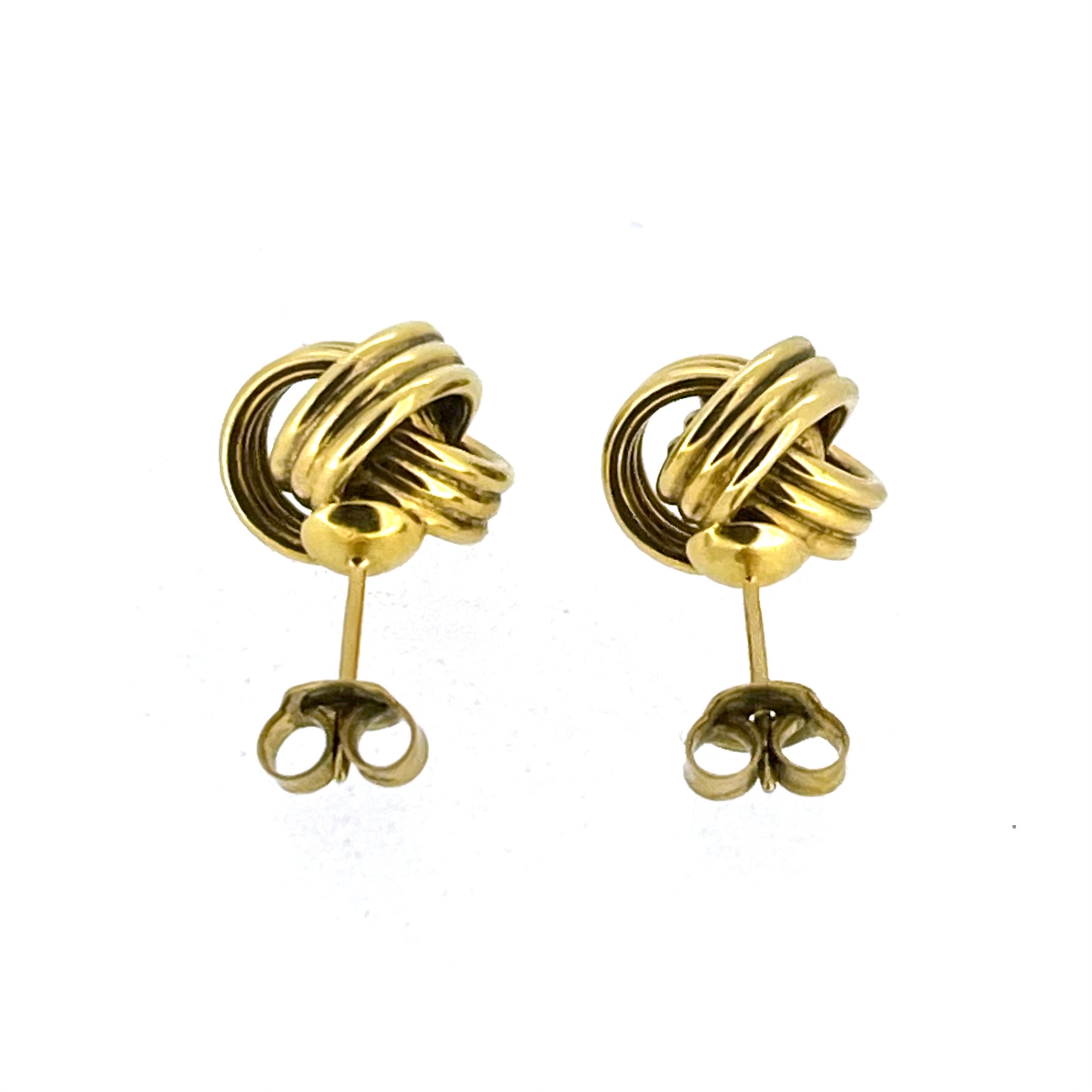 Side angle of Links of London knot stud earrings with butterfly backs