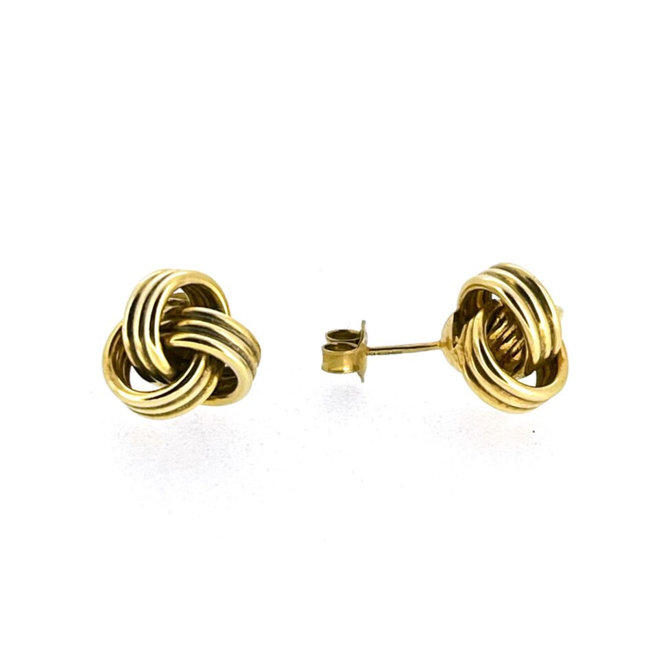 Front angle of vintage knot stud earrings in yellow gold vermeil