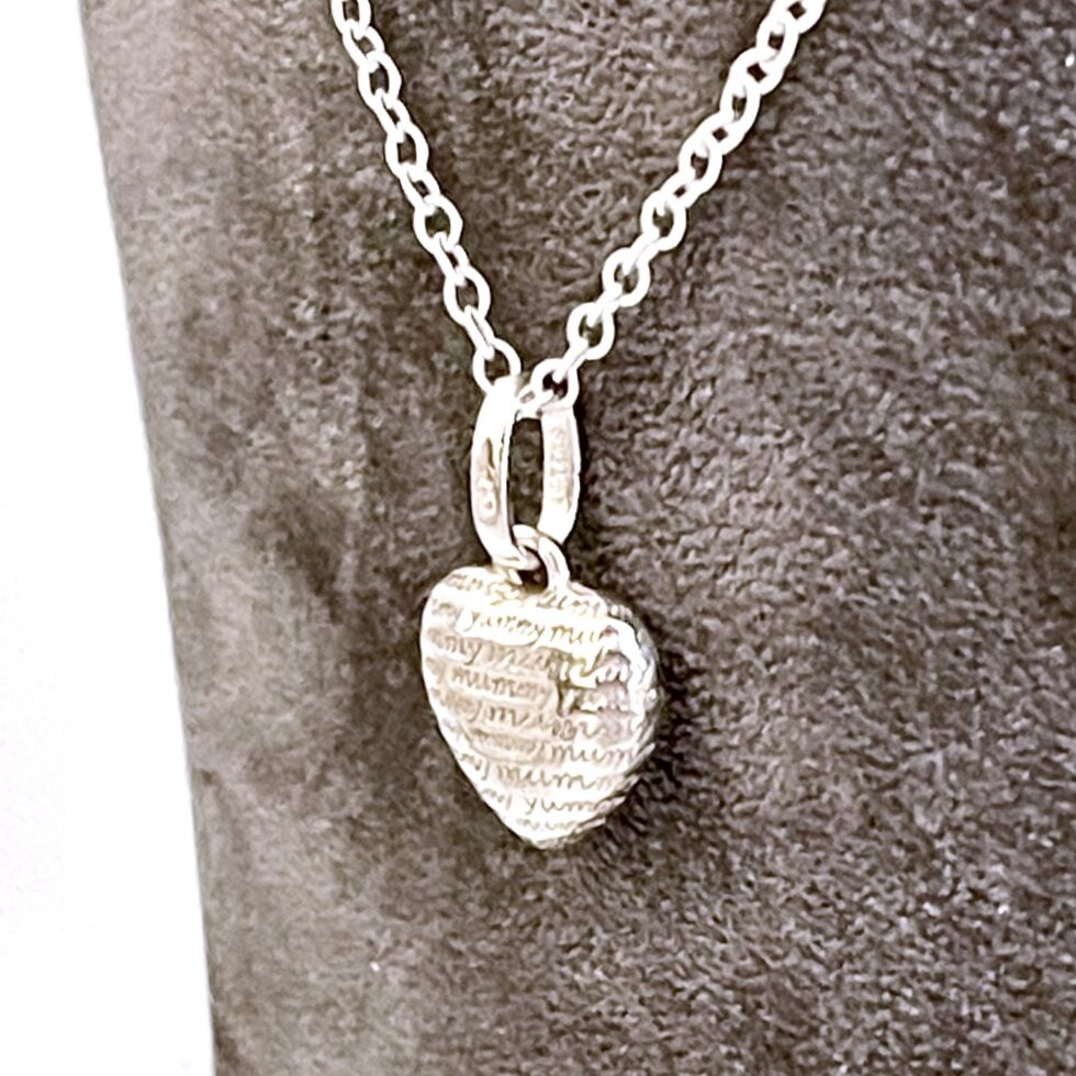 Heart-shaped Yummy Mummy necklace front view in sterling silver