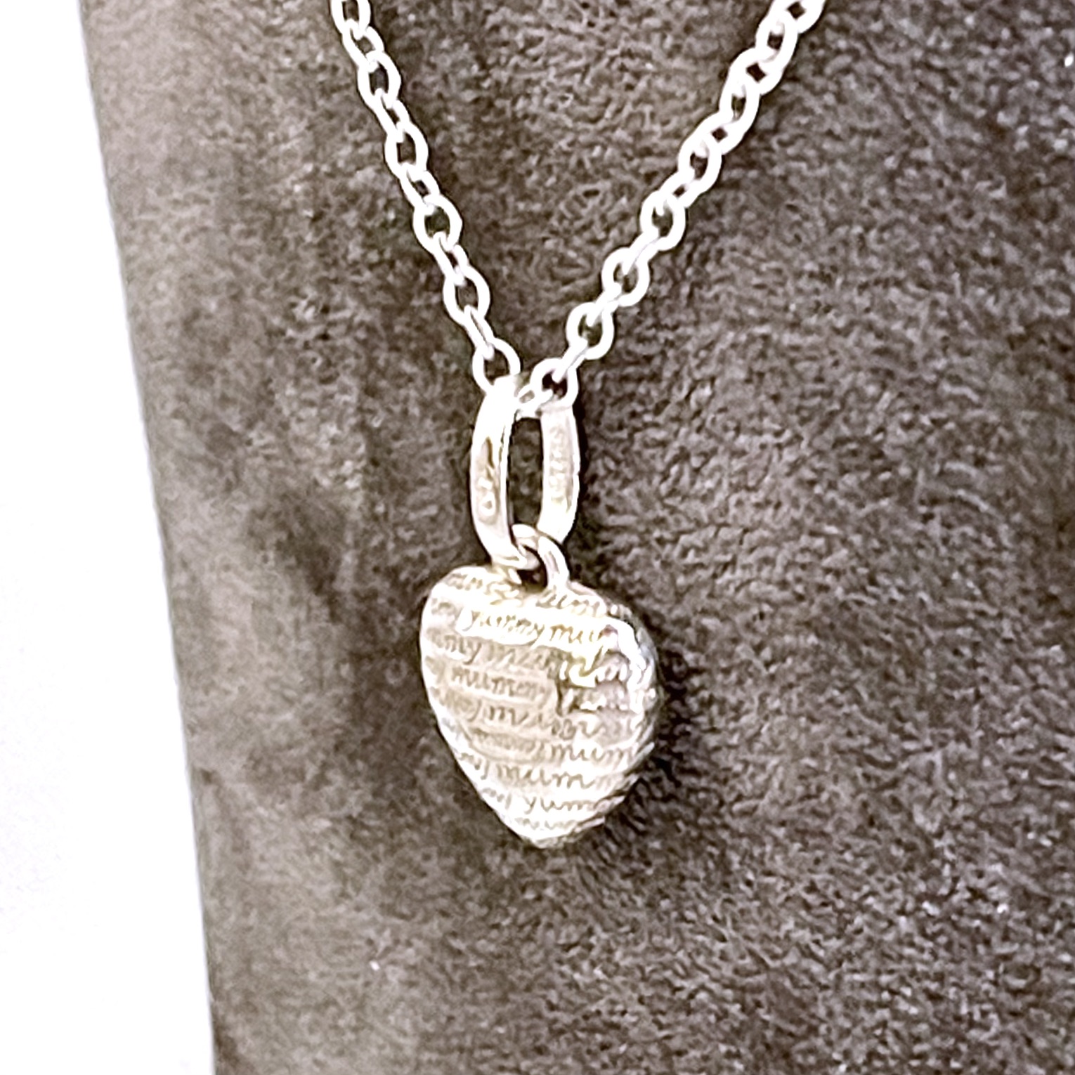 Heart-shaped Yummy Mummy necklace front view in sterling silver
