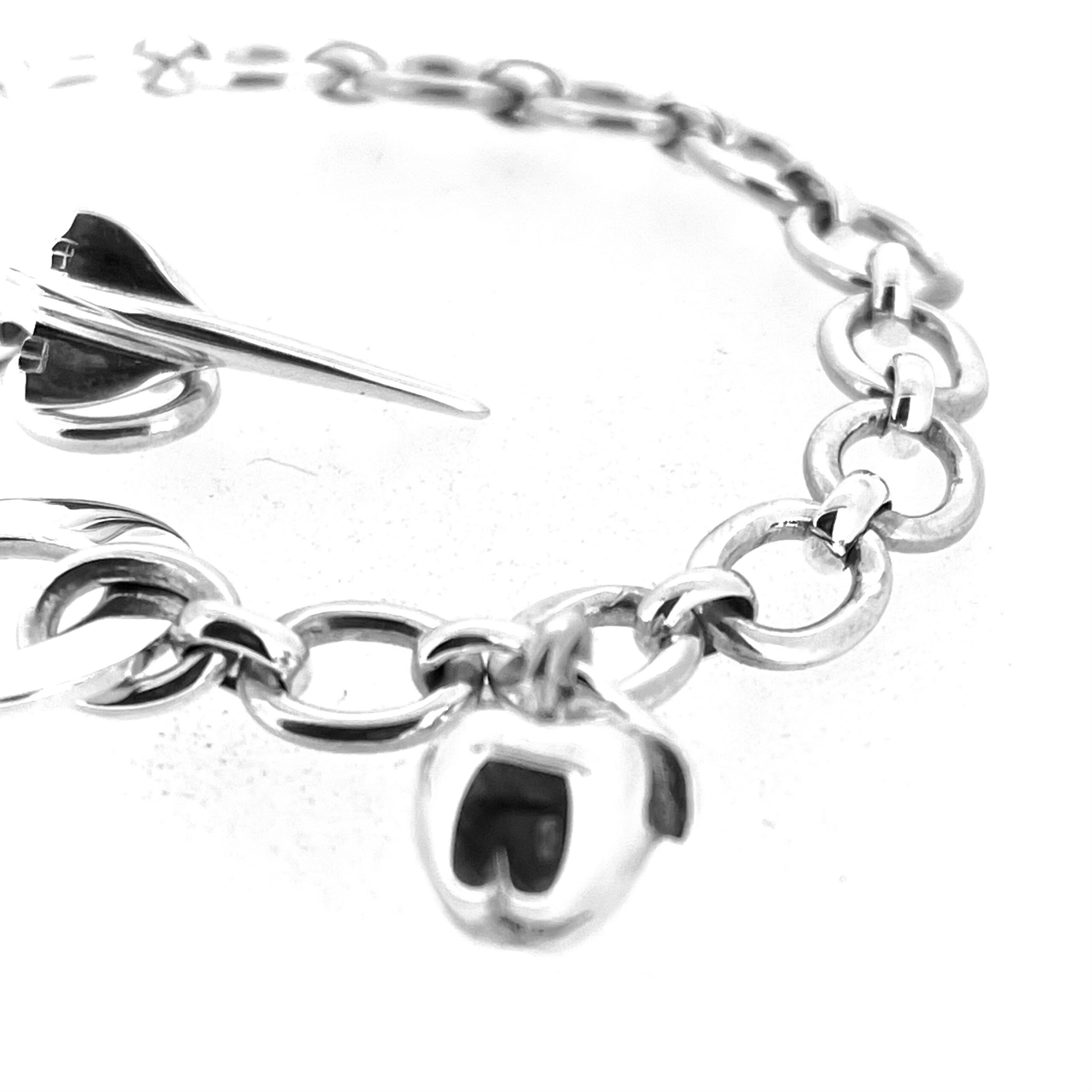 Sterling silver Concorde bracelet with polished apple charm detail