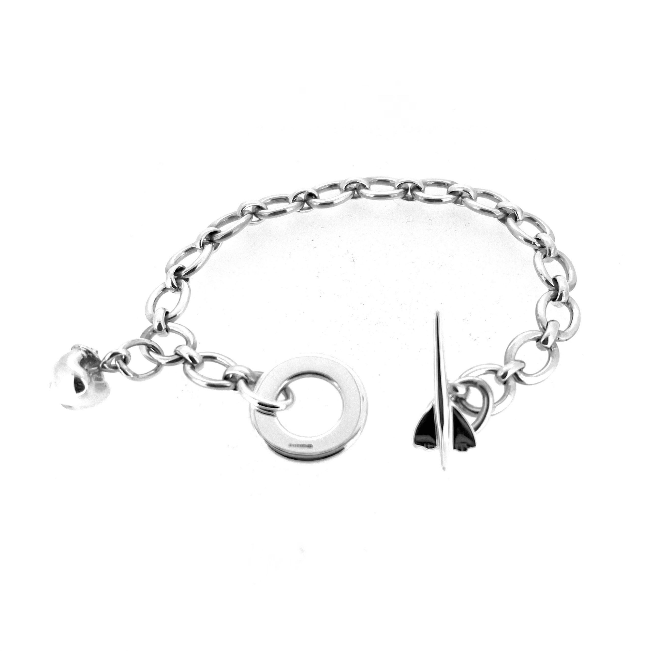 Vintage Links of London travel themed bracelet with apple charm