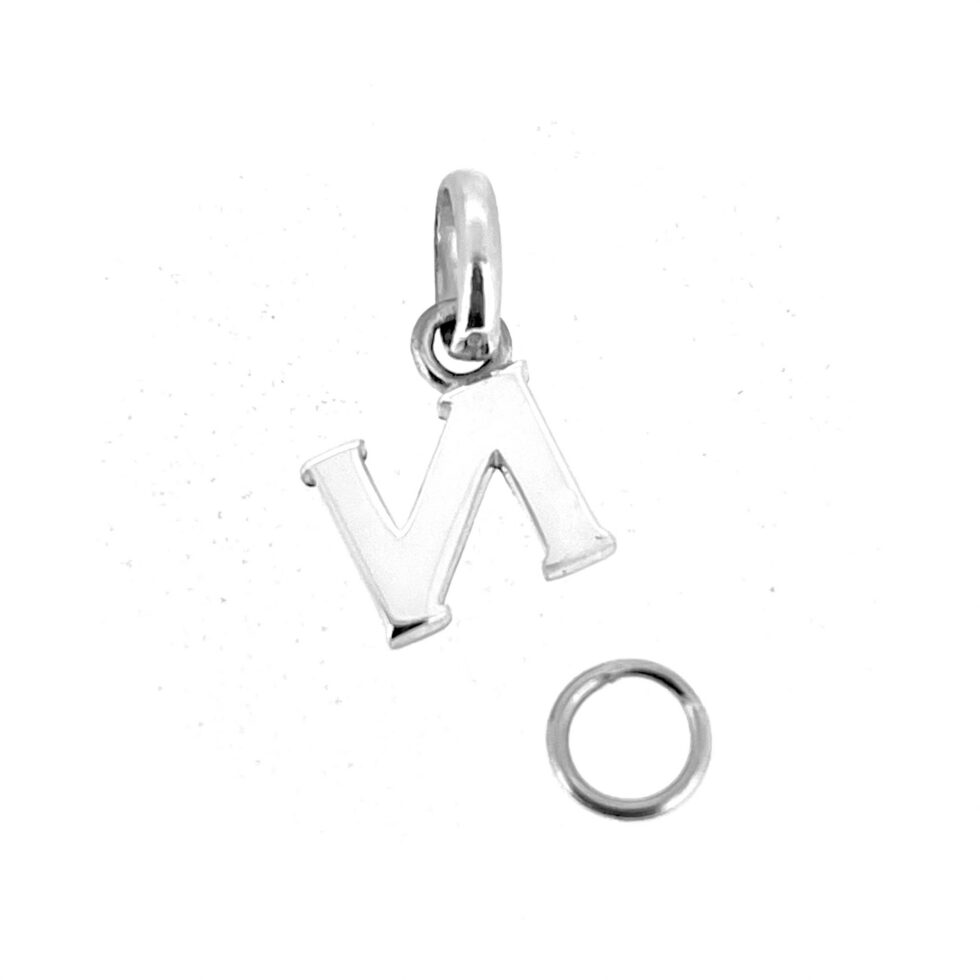 A refined vintage letter charm for bracelet or necklace wear.