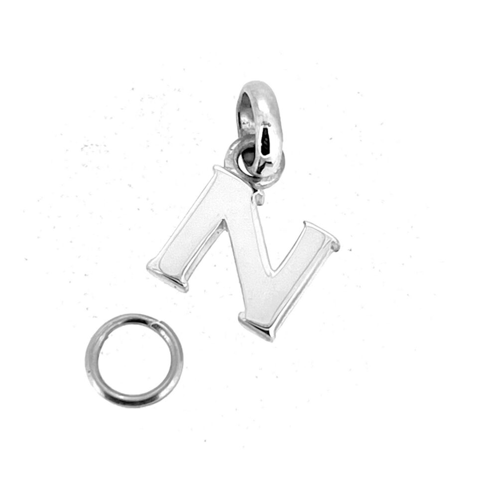 A classic initial in sterling silver.