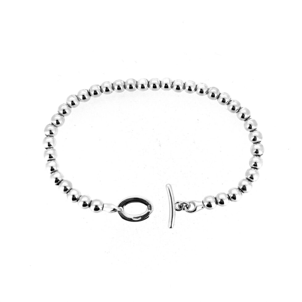 Vintage Links of London sterling silver 5mm bead toggle bracelet laid flat