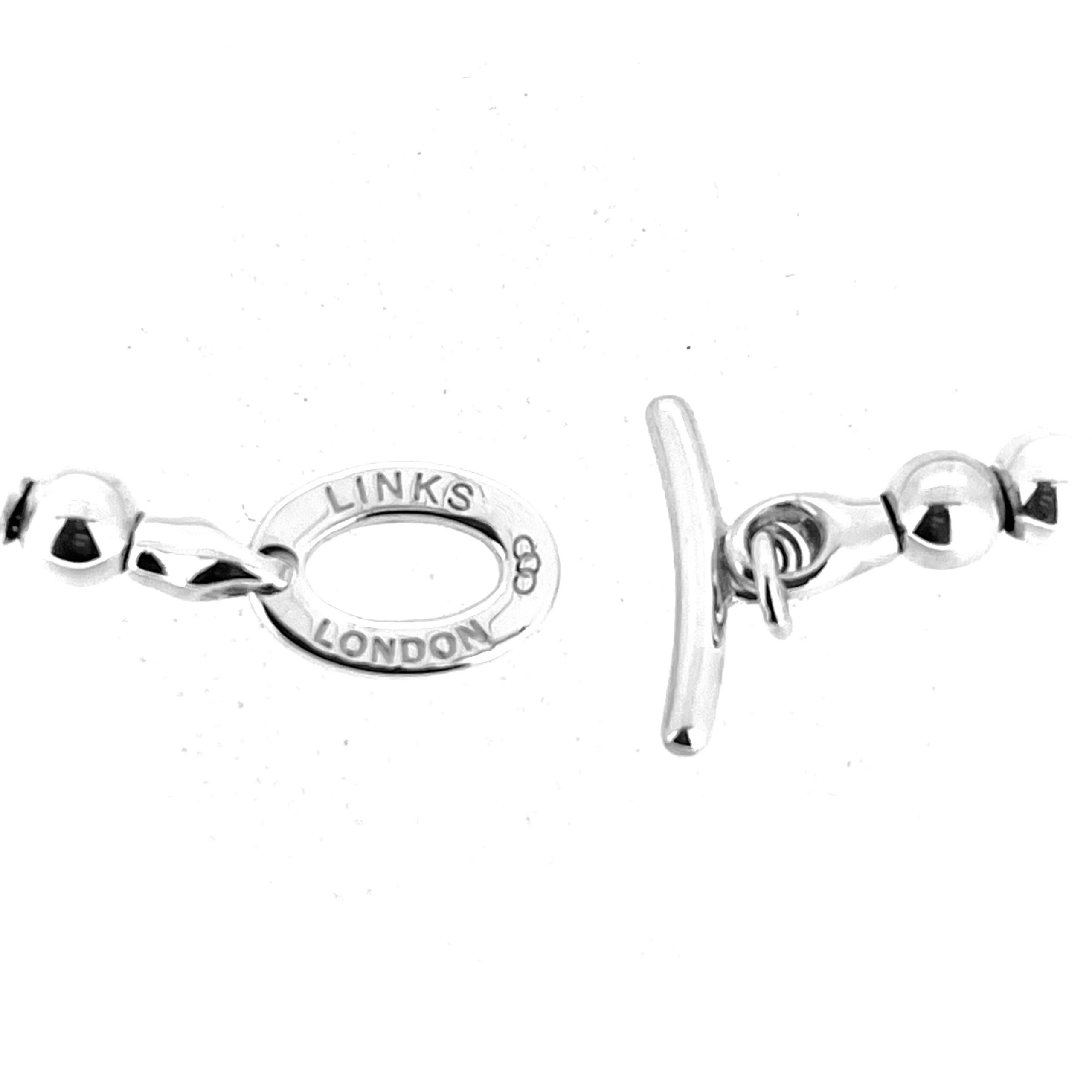 Detail of 5mm silver beads on snake chain bracelet by Links of London