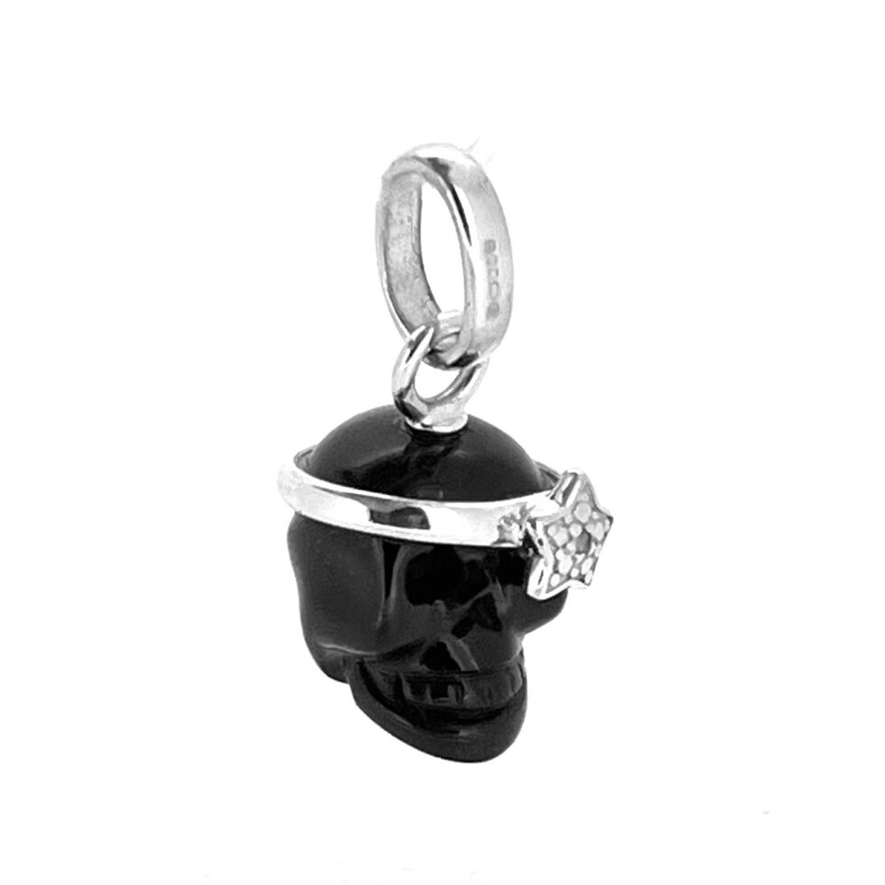 Vintage 2011 Links of London black agate skull charm with sterling silver star detail