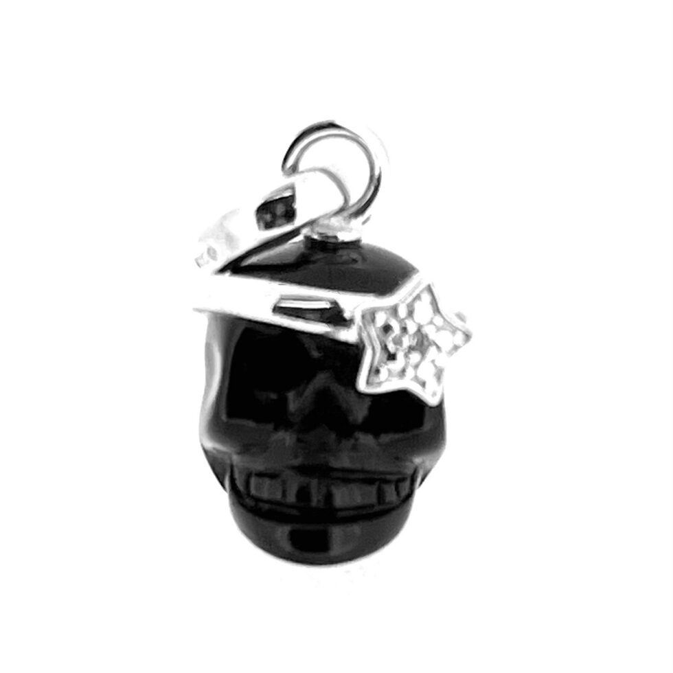 Small black skull charm with white topaz star detail