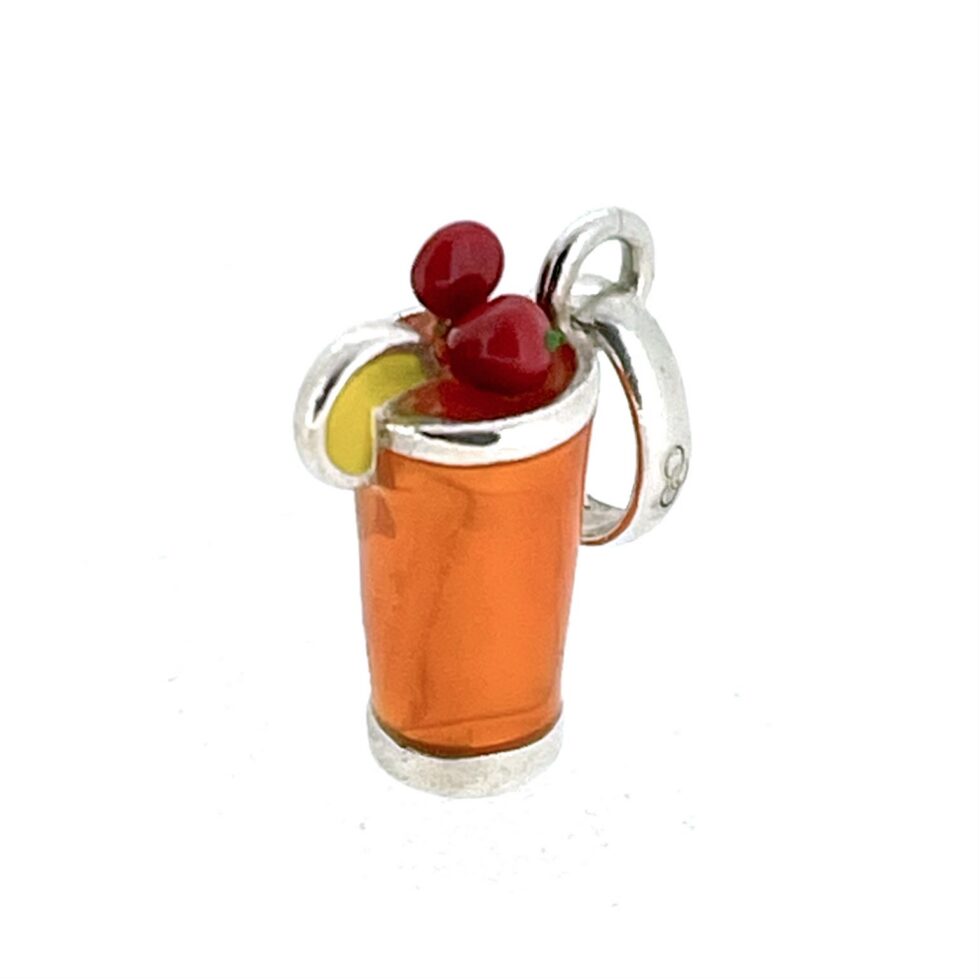Orange enamel drink charm with red and yellow garnish