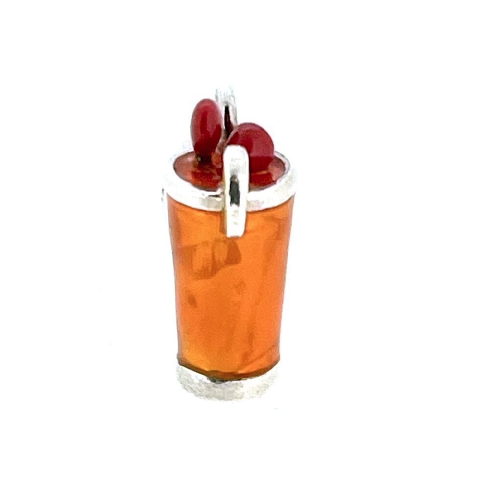 Small sterling silver cocktail charm with orange glass enamel