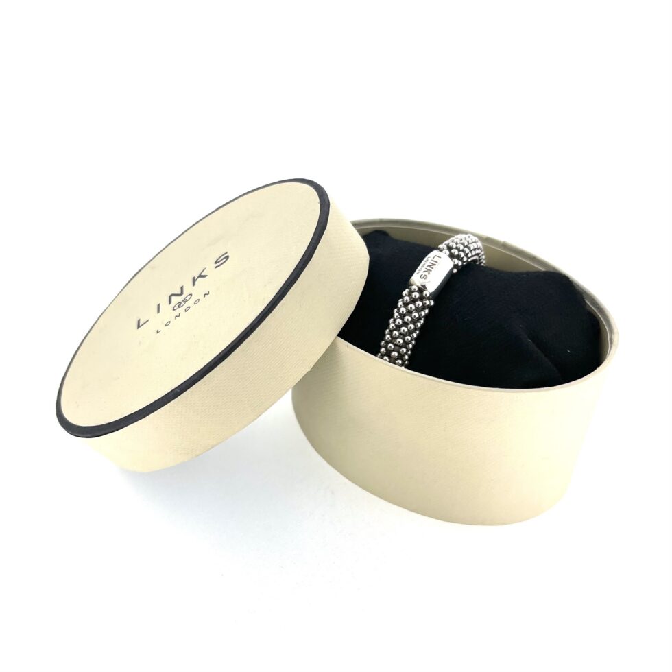 Links of London bracelet showing dense star-shaped silver texture