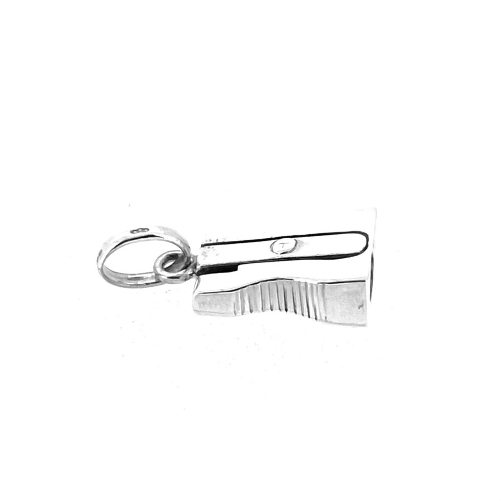Miniature silver pencil sharpener with oval bail