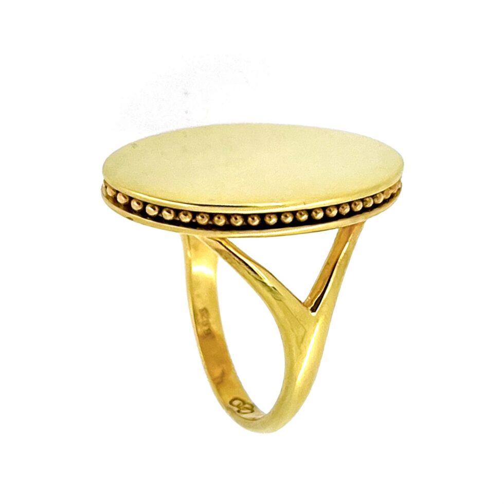 Large oval gold plated Narrative ring side view