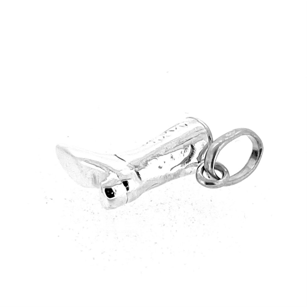 Cowboy boot charm showing vintage pattern wear