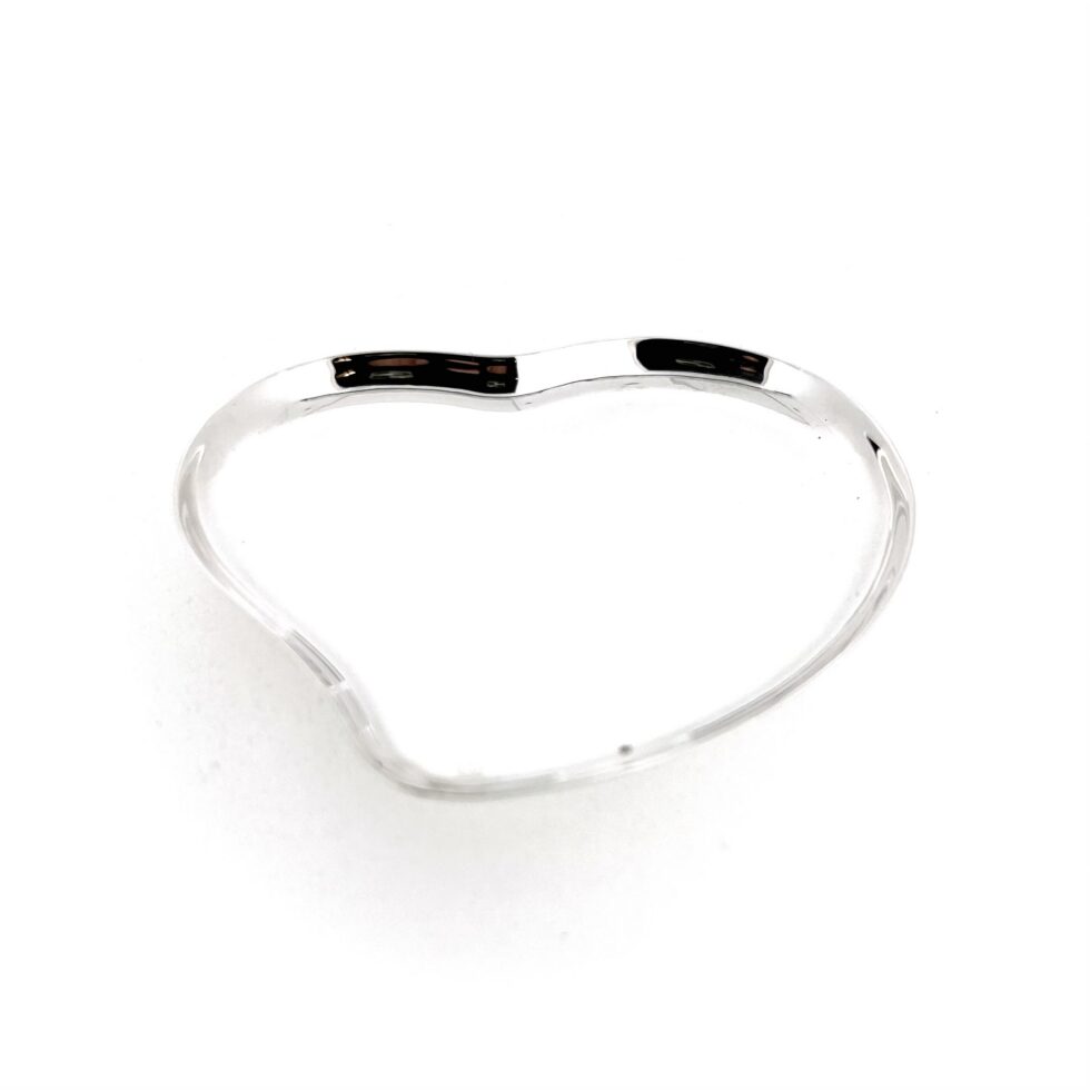 Side view of shallow sterling silver heart trinket dish