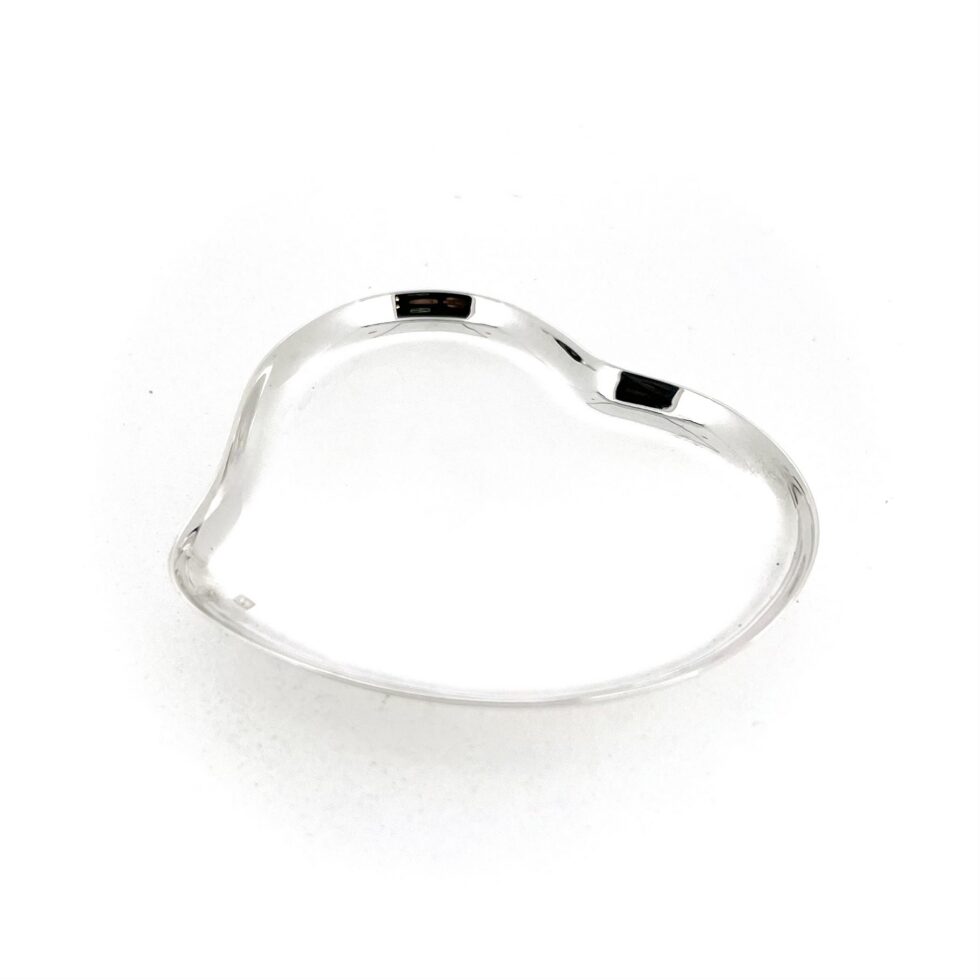 Small polished silver heart dish for rings and pins
