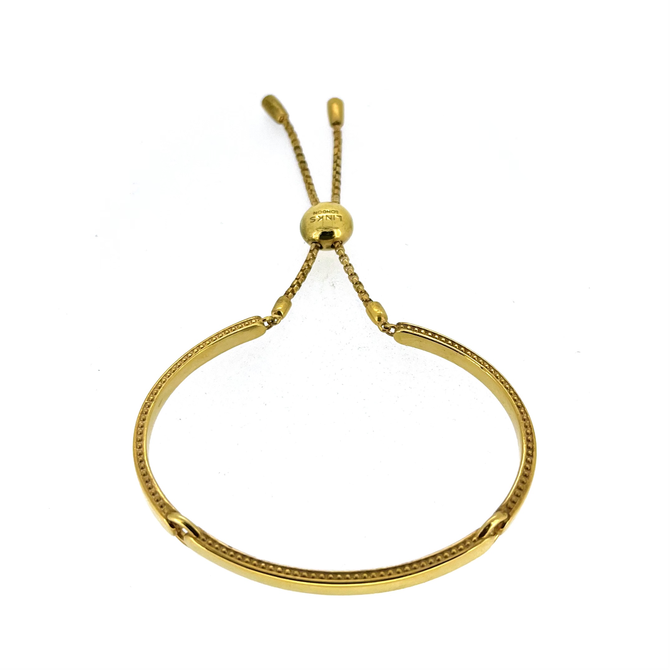 Narrative Bracelet showing 10mm gold slider clasp