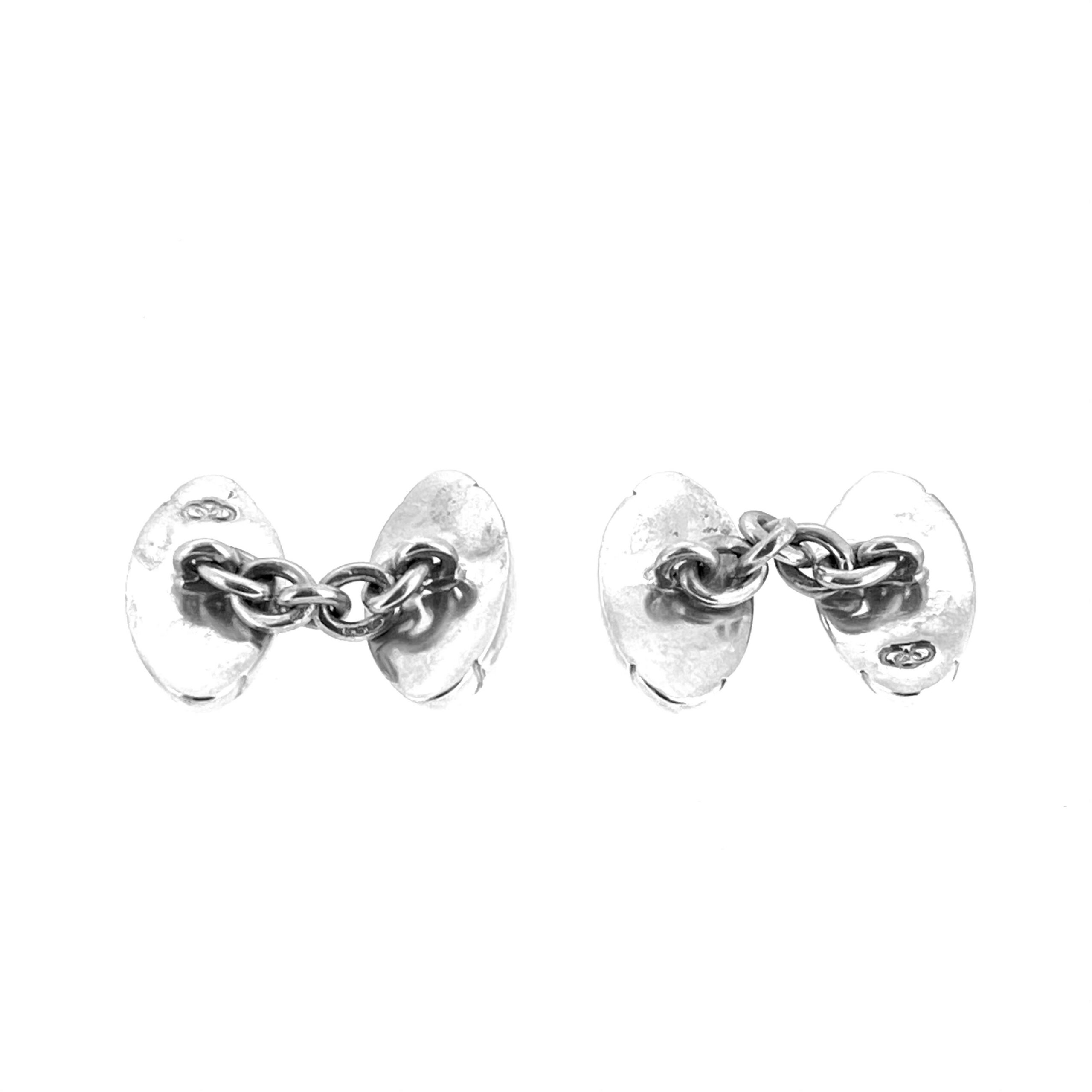 Vintage silver rugby cufflinks with engraved lacing detail