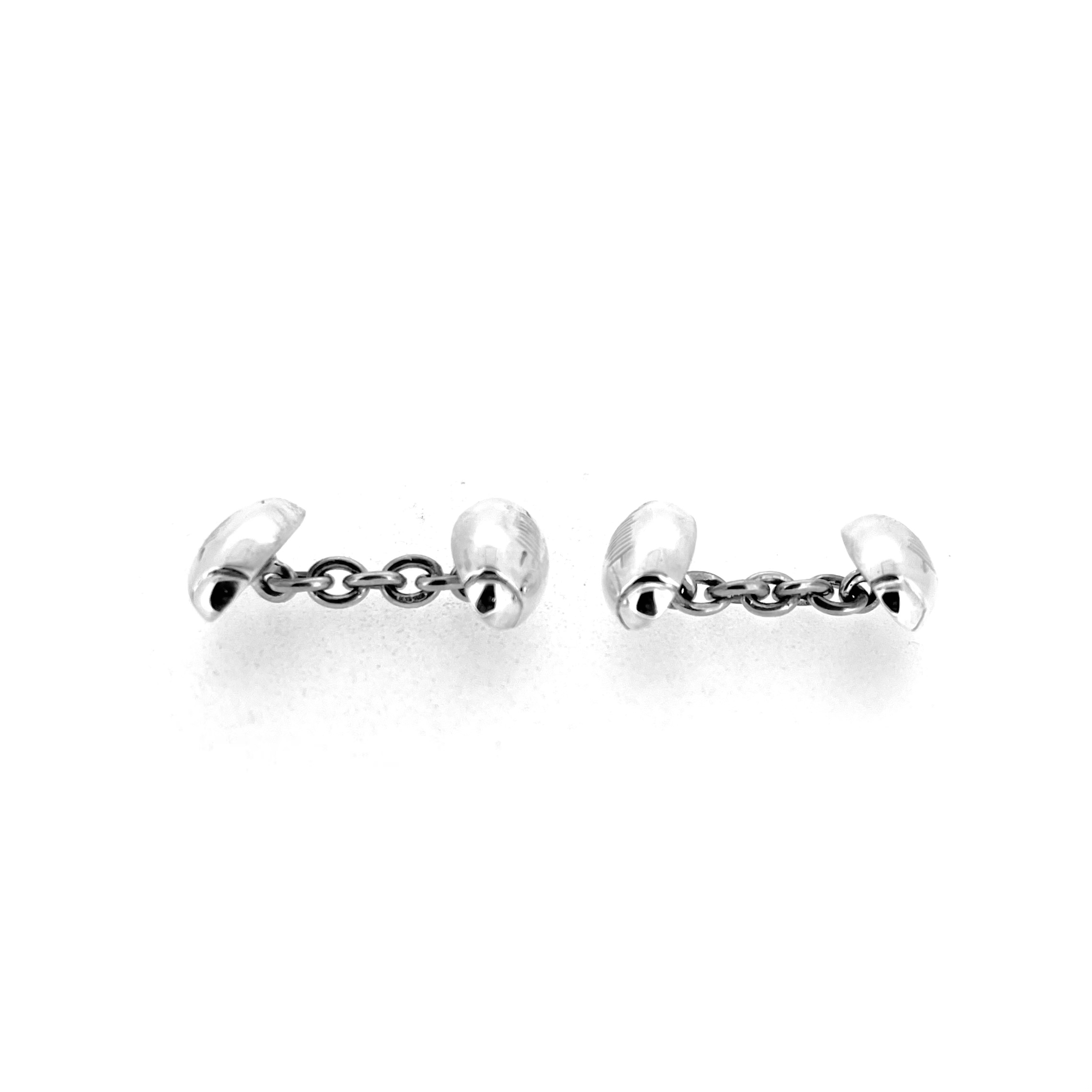 Sterling silver cufflinks with subtle rugby ball seam design