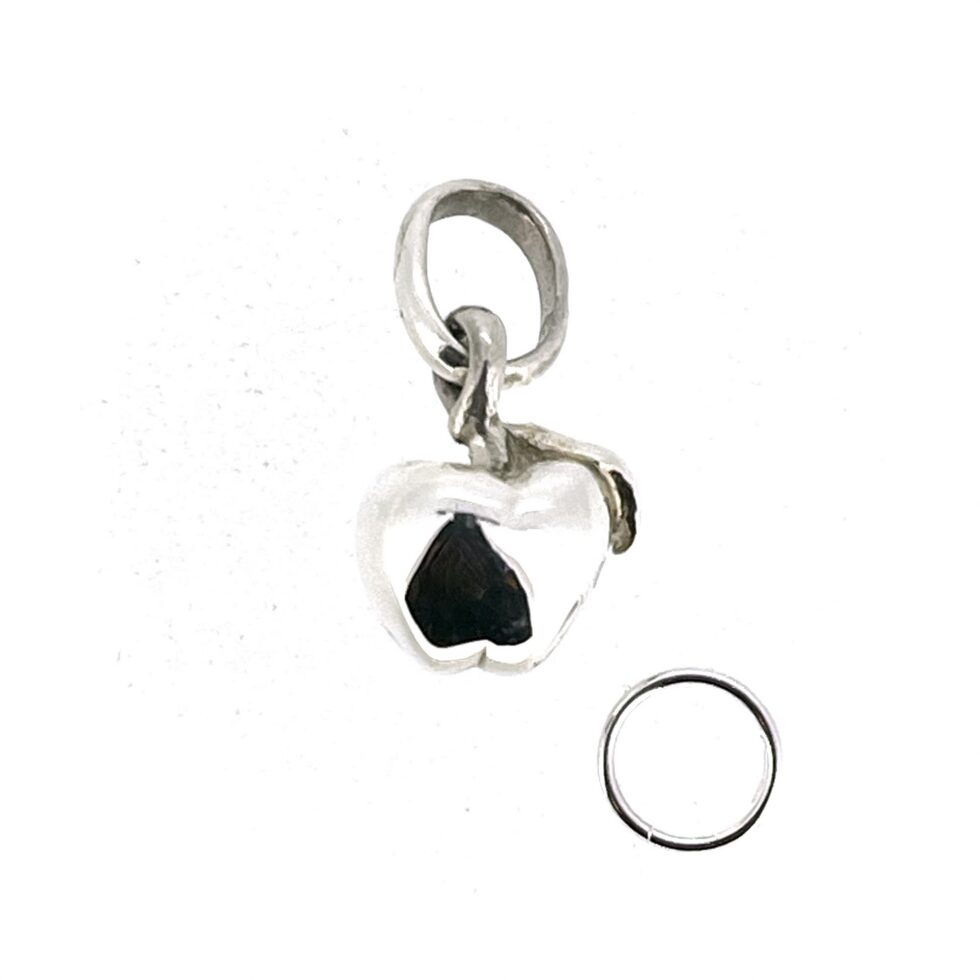 Sterling silver apple charm measuring approximately 10mm wide