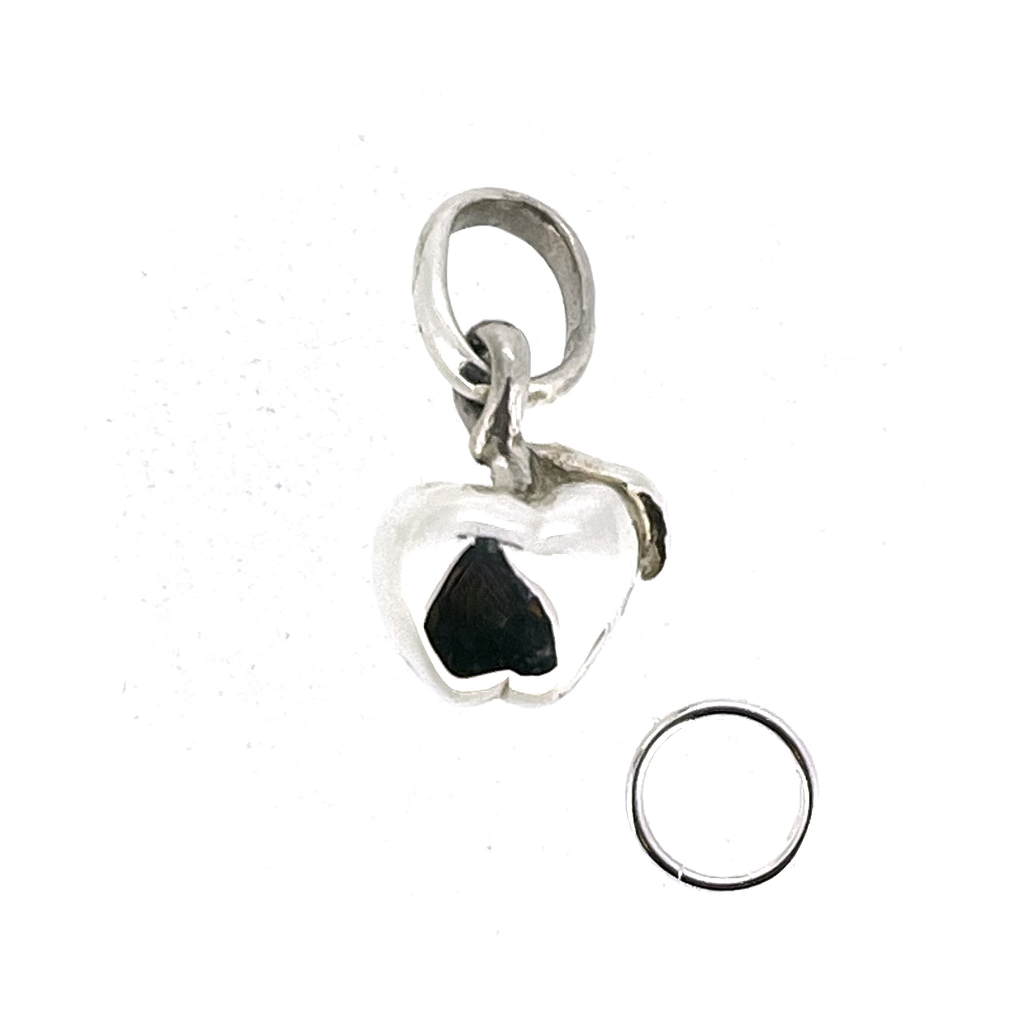 Sterling silver apple charm measuring approximately 10mm wide