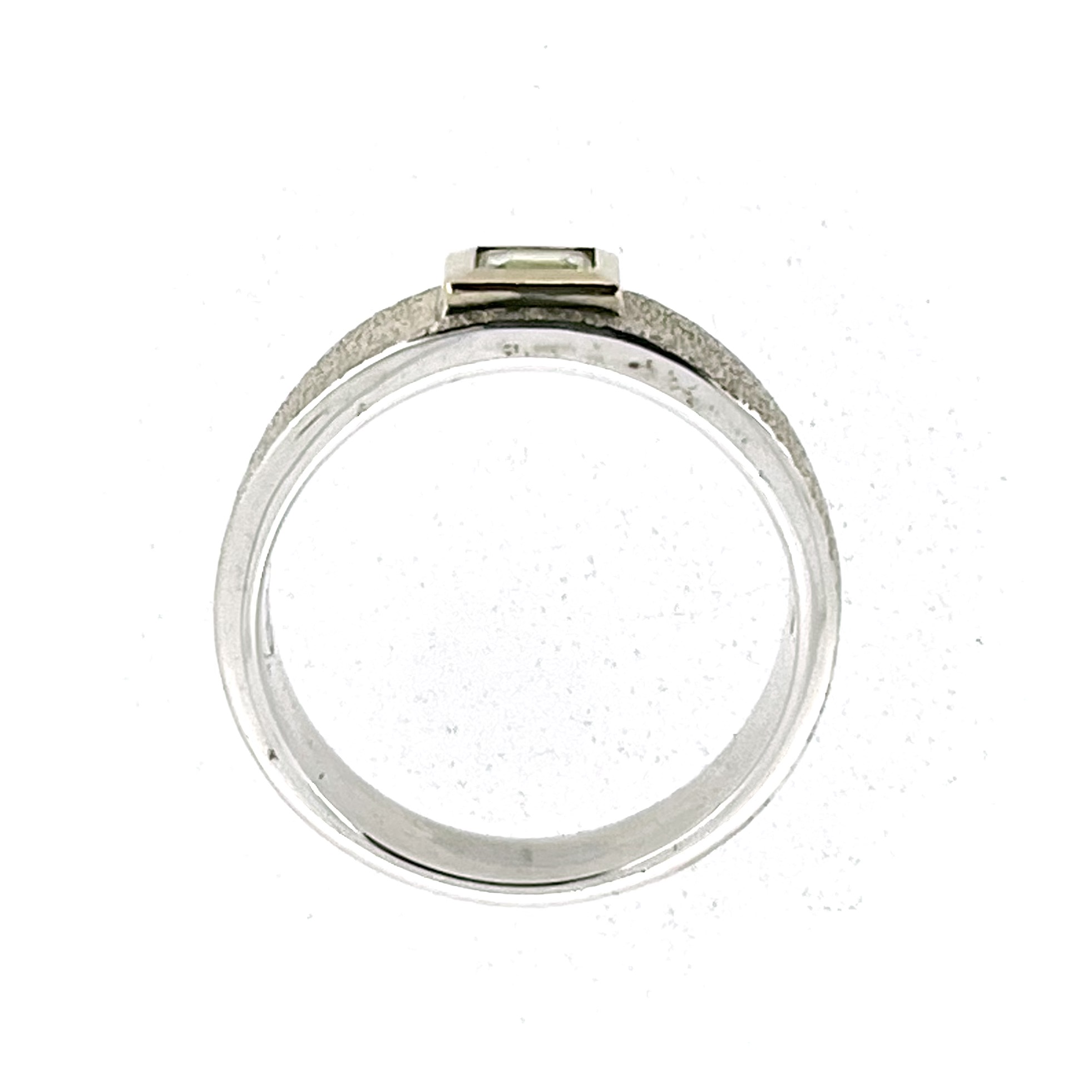 Links of London ring showing 7.5mm textured front