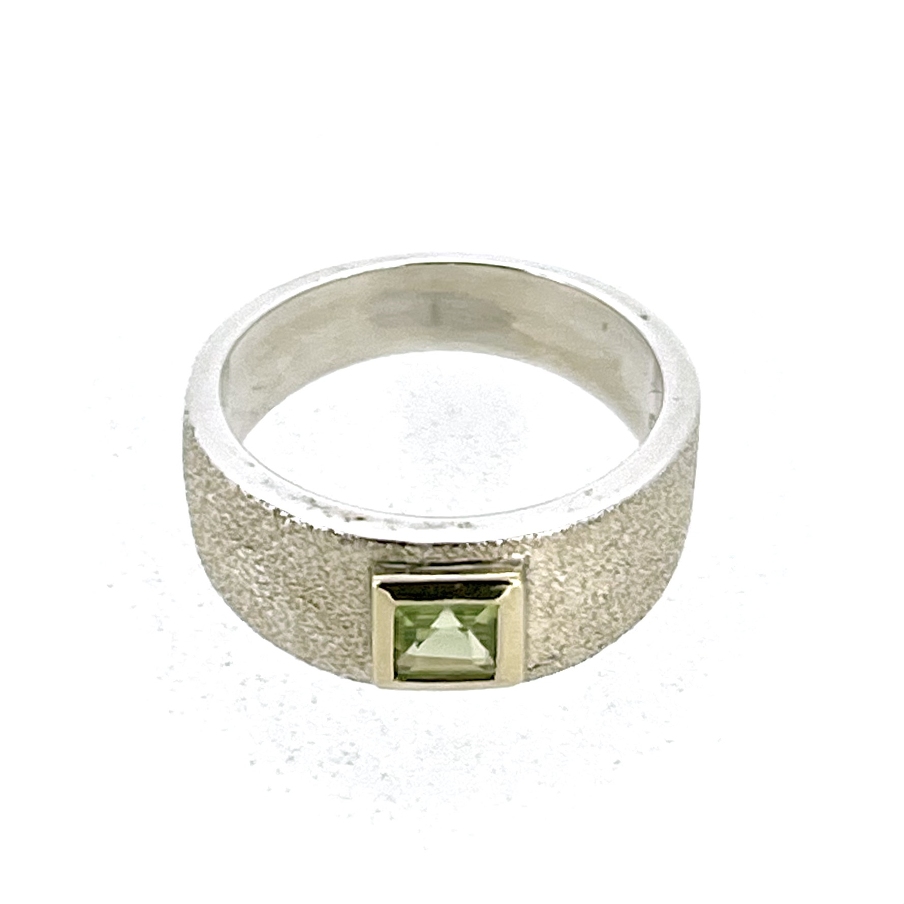 Sterling silver ring with 5mm green peridot gemstone