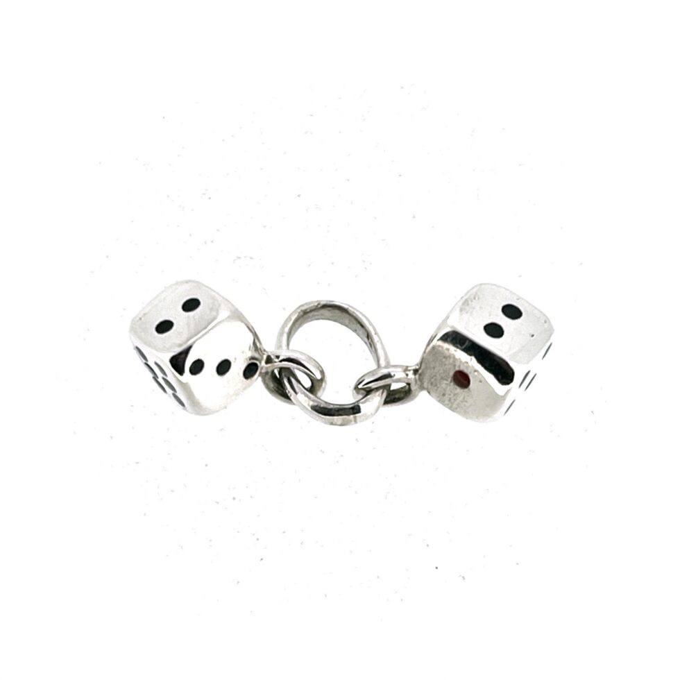 Pair of miniature silver dice with black enamel pips