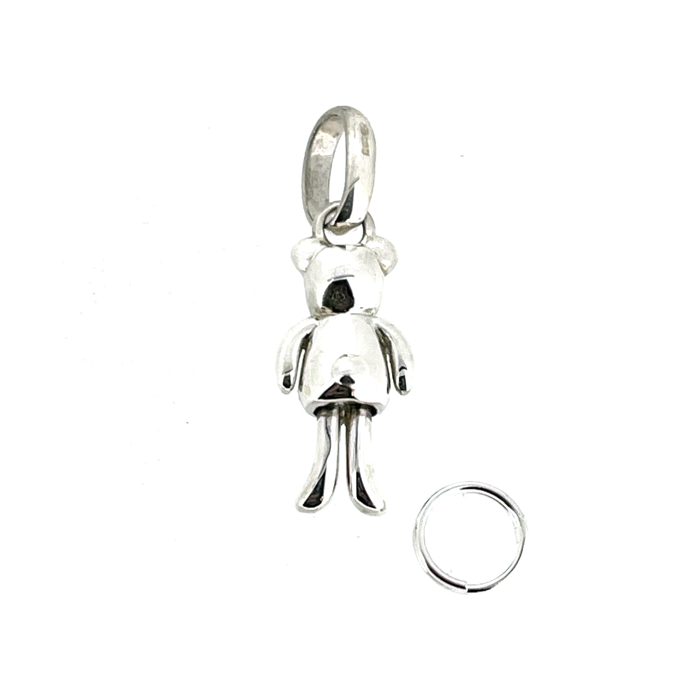 Rounded ears, little arms and long articulated legs in miniature.